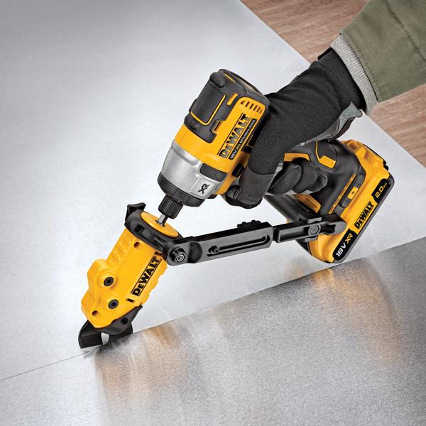 DEWALT power tool with attachment cutting sheet metal, operated by a gloved hand.